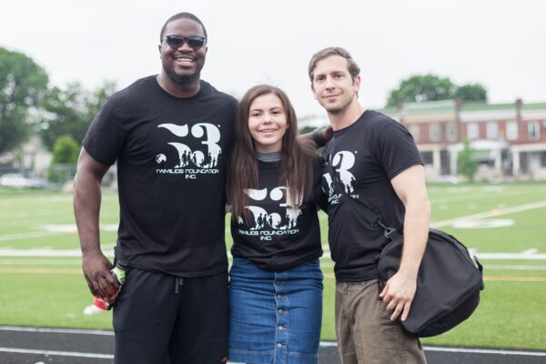 MGG strives to be as involved as possible with our community. Here, co-director Dr. Galiatsatos poses with a volunteer and Hof City Sports representatives at a summer sports camp.