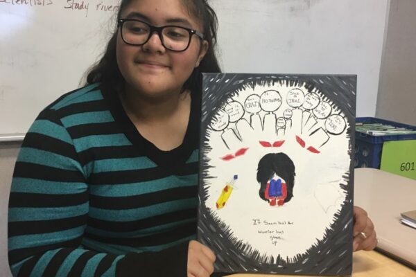 This student wishes to express the battle fought by those experiencing depression. The young girl in her artwork is equipped with a sword and shield as those around her shout harmful words and judge from afar.